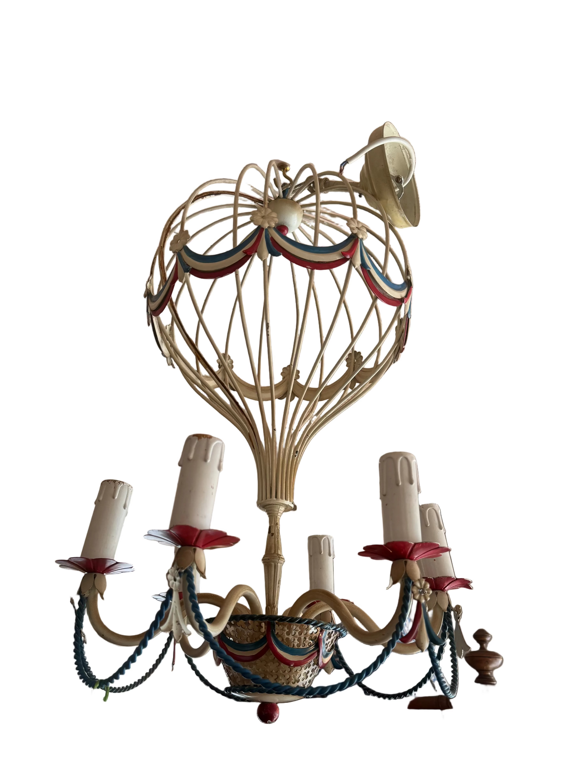 Chandelier designed like a hot air balloon with ribbons on a white background